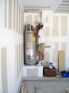 Sam, one of our Gilroy water heater repair experts is investigating a broken unit